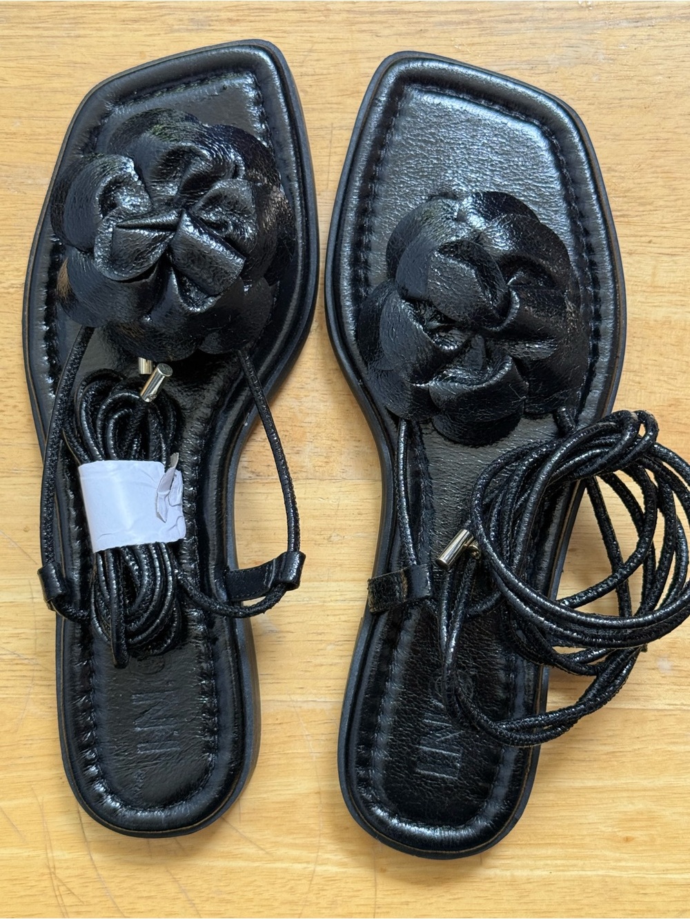 INC black flats sandals with floral upper. NWOB